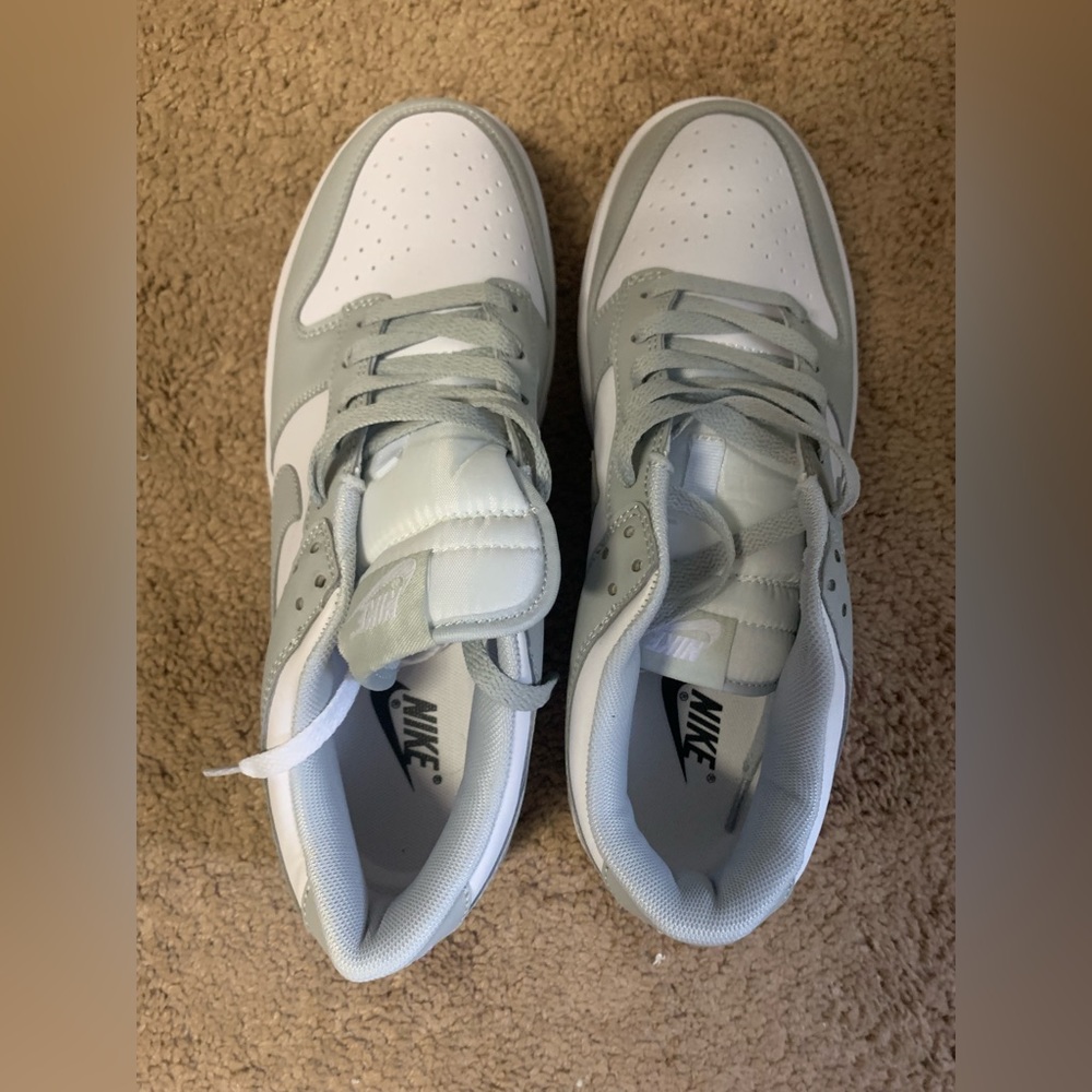 Grey and white low Nike dunks